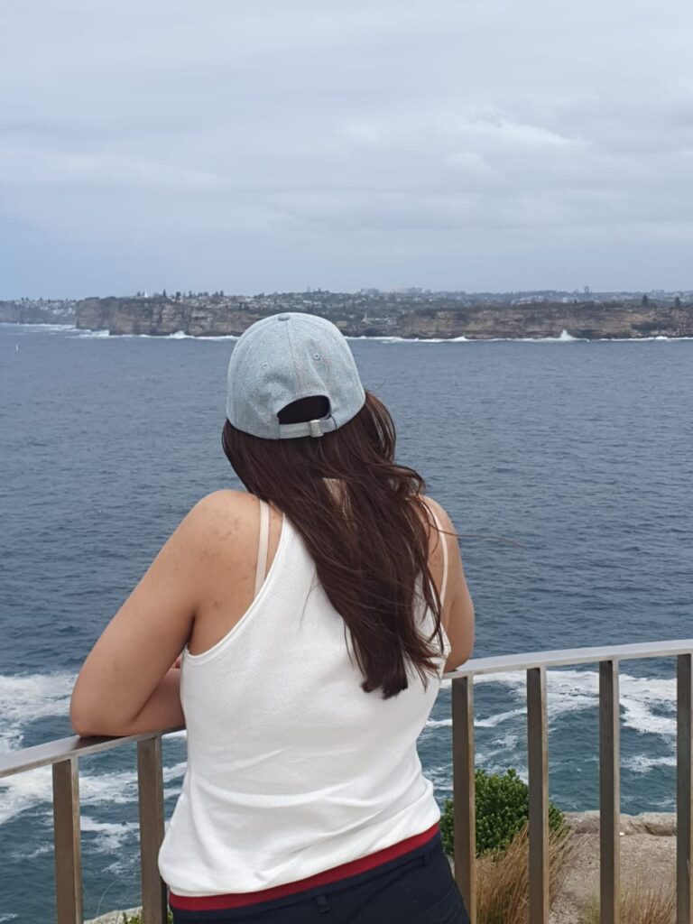 Girl standing near the railing